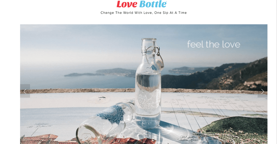A screenshot of the Love Bottle website banner, showing their artistic and reusable glass water bottles made in the USA.