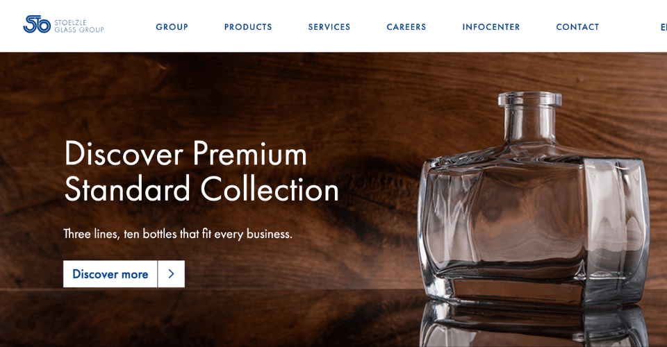 A screenshot of the Stoelzle Glass Group website banner, displaying their premium glass for spirits, pharma, and beauty markets.