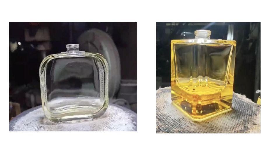 A shot from inside the LOM GLASSWORKS factory, showing a line of pristine, newly-molded custom glass perfume bottles ready for the next stage of production.